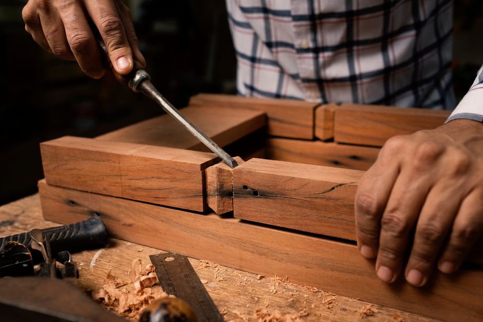 Woodworker crafting bespoke handmade furniture